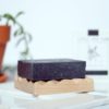 charcoal soap on soap dish